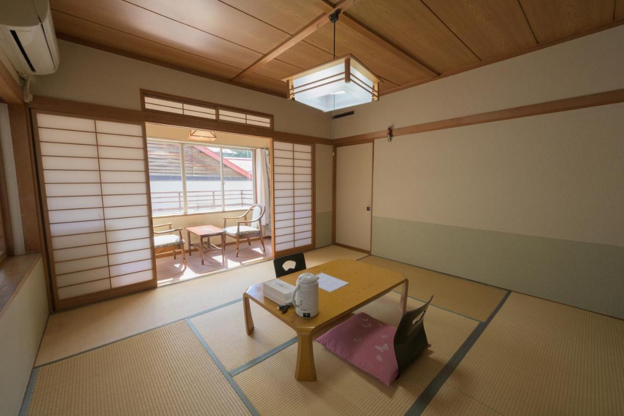 Hotel Shibu Onsen Kadoya à Yamanouchi  Extérieur photo